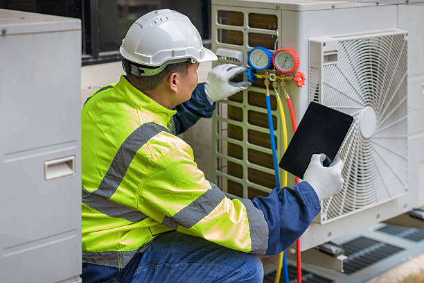 Professional Hvac technician working in Connersville, IN